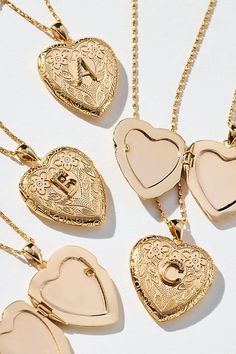 Fancy this: the season’s most treasured giftables. A monogram moment stands out on this functional locket, delicately detailed with a floral design. | Monogram Heart Locket Necklace by Anthropologie in Alphabet, Women's, Gold/Plated Brass Celebrate love with unique and meaningful anniversary gift ideas for every milestone. From personalized keepsakes to romantic surprises, discover the perfect way to show you care. Click to explore unforgettable gifts for your special day! Cute Rose Gold Necklace, Cute Jewelry Girlfriend, Gold Heart Necklace Wallpaper, Luxury Jewelry Gift For Her, Cheap Locket Jewelry For Mother's Day, Christam Gifts For Mom, Cheap Personalized Locket Necklace Gift, Cute Necklaces Aestheti, Gold Necklace Beautiful