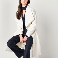 Add some chic outerwear to your closet with this women's Worthington coat. It's made from soft woven fabric with an oversized draped collar, long sleeves, side slip pockets, and a self-tie waist. Perfect for cooler weather, layer it over everything from dresses to leggings and a t-shirt.Features: BeltedClosure Type: ButtonFit: FittedNeckline: Draped NeckPockets: 2 Side Slip PocketsSleeve Length: Long SleeveWarmth Factor: MidweightApparel Length: 40 InchesOuterwear Length: LongFiber Content: 90% Polyester, 10% RayonFabric Description: WovenLining Material: PolyesterCoat Style: Wool CoatsCare: Dry Clean OnlyCountry of Origin: Imported Chic Outerwear For Work, Winter White Lapel Collar Outerwear For Fall, Winter White Outerwear With Lapel Collar For Fall, Chic Wool Coat With Pockets, Trendy Long Wool Coat For Spring, Winter White Single-breasted Outerwear With Lapel Collar, Winter White Single Breasted Outerwear With Lapel Collar, Cream Notch Lapel Outerwear For Winter, Trendy Notch Lapel Winter Outerwear