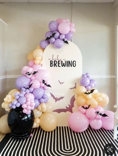 balloon arch with bats and bats on it