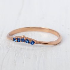 Sapphire Wedding Band, Small Curved Wedding Band, Gold Dainty Wedding Band, Womens Sapphire Ring, Gold Sapphire Ring, Blue Sapphire Ring WE OFFER UNLIMITED PERIOD INSTALLMENTS PLAN This is a beautiful, stunning, feminine ring that works well for all occasions, styles, and ages. You will love it! Ring information: Main stone: Blue Sapphire Approximate size: 1.5mm (5 stones) Metal type: Gold Metal stamp: 14k Gold Installment Payments We offer installment payments for an unlimited period for absolu Sapphire Half Eternity Ring For Wedding, Sapphire Ring Gold, Wedding Band Gold, Dainty Wedding Band, Ring Blue Sapphire, Dainty Wedding, Gold Sapphire Ring, Oval Cut Ring, Sapphire Wedding Band