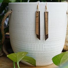 Metallic speckled cork adds a touch of sparkle to these layered cork and leather earrings. Total dangle length: 3.5" Maximum width: 0.25" Cork Screw Earrings, Diy Earrings Leather Ideas, Leather Earrings Ideas, Layered Earrings, Cork Jewelry, Cork Earrings, Bracelet Craft, Laser Ideas, Denim Jewelry