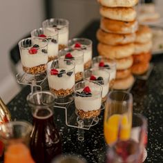 desserts and drinks are lined up on a table