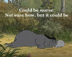 a hippo laying on the ground in front of some trees and grass with a quote from winnie the pooh