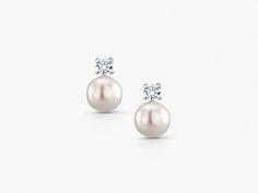 Freshwater Cultured Pearl and CZ Studs, Pearl Jewelry, Real Pearl CZ Studs, Genuine Pearl Studs, Bridal Jewelry, Pearl Wedding Earrings, Silver Pearl Studs, Pearl Bridesmaid Jewelry, June Birthstone This 9mm freshwater culture pearl with cubic zirconia earring is shiny, gorgeous, elegant and graceful . Best jewelry for women, girls to attend parties, weddings or any other activities. .CRAFTED : 925 Sterling Silver Rhodium Plated for a life-time luster. Stamped 925, high polished finish, nickel f Classic Bridal Earrings With Sparkling Stones, Classic Cubic Zirconia Diamond Earrings For Wedding, White Pearl Earrings With Diamond Accents For Wedding, Classic White Pearl Earrings With Cubic Zirconia, Classic White Cubic Zirconia Pearl Earrings, White Gold Pearl Earrings With Diamond Accents For Wedding, White Diamond Earrings With Accents For Wedding, Classic Diamond Earrings With Sparkling Stones, Classic Diamond White Earrings For Wedding