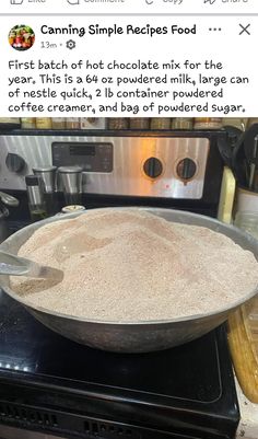 a bowl filled with rice sitting on top of a stove next to an electric oven