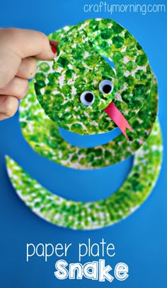 a paper plate snake craft for kids to make with the letter s and it's mouth