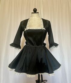 Victorian style stretch taffeta dress with ruffled lace detailing and back bow. iMPORTANT ♥️ Please contact us if you need or want an order by a certain time frame as our production and shipping times vary. We need to know in advance for orders with specific deadlines. Thank you! Fitted Taffeta Dress With Ruffles, Formal Taffeta Dress With Ruffles, Formal Taffeta Ruffle Dresses, Elegant Costume Dresses With Ruffles, Elegant Ruffled Costume Dresses, Elegant Ruffled Dress For Costume, Elegant Ruffled Dresses For Costumes, Satin Dress With Attached Cancan For Costume Party, Marie Antoinette Style Fitted Dress With Ruffles