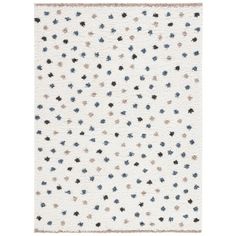 a white rug with black and blue stars on it