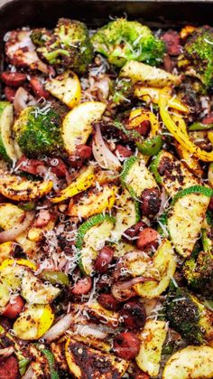 a casserole dish with broccoli, beans and onions