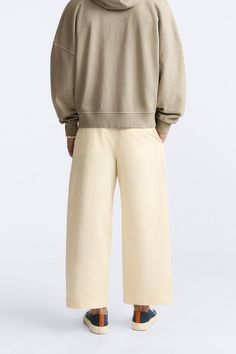 LIMITED EDITION BELTED PANTS - Lemon | ZARA United States Cotton Wide-leg Sweatpants, Relaxed Fit Solid Color Chinos With Belt Loops, Utility Style Relaxed Fit Chinos With Belt Loops, Cotton Wide-leg Pants, Classic Straight Sweatpants With Pockets, Cotton Straight Sweatpants For Elevated Casual, Spring Wide Leg Cotton Sweatpants, High-waisted Beige Cotton Cargo Pants, Wide Leg Cotton Sweatpants For Spring