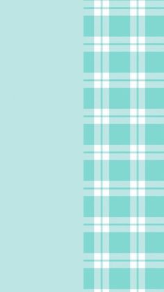 a blue and white checkered pattern on a light green background