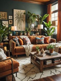 a living room filled with furniture and lots of plants