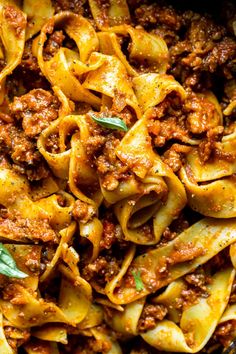 pasta with meat and sauce in a pan