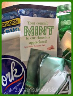 an assortment of snacks and candy with a sign that reads your commit mint to our church is appreciaterated