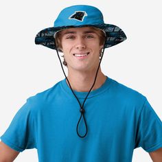 Sun-sational style is coming your way! Make sure you're the coolest fan at the tailgate, beach, or ballgame in this Carolina Panthers Solid Hybrid Boonie Hat! Features All-over, team-colored design so you can rep the team in style Embroidered team logo display, in case there were any doubts where your allegiances lie Adjustable black lace chin string for a comfortable wear Top vent eyelets for optimal air flow and comfort Team-colored, tropical design with repeat team logo display on panel under Boonie Hat, Outdoor Hat, Logo Display, Outdoor Hats, Tropical Design, Los Angeles Rams, Carolina Panthers, Face Cover, Cooling Fan