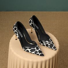 These stylish dorsay heels are perfect for any fashion-savvy woman. The leopard print adds a touch of wildness. while the pointed toe gives them a sleek and elegant look. They're sure to turn heads wherever you go! Upper: Fur + Leather Lining: Leather Outsole: TPR Toe: Pointed Toe Closure: Slip on Heel:  8.5cm/3.3'' Color: Black and White. Black and Apricot made: Yes Leopard Print Heels With 4-inch Pointed Toe, Leopard Print Pointed Toe Heels For Evening, Chic Leopard Print Heels With Pointed Toe, Leopard Print Heels With Pointed Toe And 4-inch Heel, Chic Leopard Print Heels With 4-inch Heel, Chic 4-inch Leopard Print Heels, Chic 4-inch Heel Leopard Print Heels, Leopard Print Pointed Toe Heels For Work, Chic Leopard Print Heels For Work