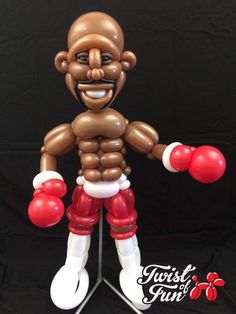 an inflatable figure with boxing gloves on