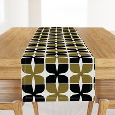 a table with a black and gold pattern on it