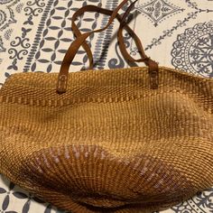 Incredible Unique Find Vintage Alaskan Woven Deep & Roomy Sally Bag. I Stuffed A Pillow To Show How Big The Bag Is And How Much It Will Hold. An Amazing Find! Chic Woven Leather Bags For Market, Chic Brown Bags For Market, Tan Woven Leather Travel Bag, Chic Tan Woven Bags, Woven Leather Pouch Straw Bag, Handwoven Market Bag, Elegant Handwoven Brown Beach Bag, Handwoven Shoulder Bag For Market, Vintage Tan Tote Shoulder Bag