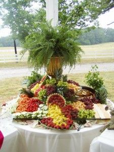 the table is full of fresh fruits and vegetables for a wedding or bridal party