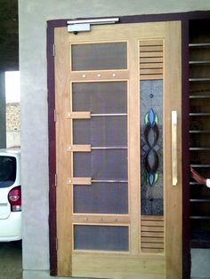 a person standing in front of a wooden door