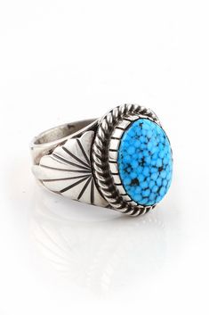 This Kingman Turquoise Men's Ring is completely hand made by a Navajo artist. An exquisite oval of Arizona Kingman Turquoise is bezel set and encircled with a sterling silver rope. The gleaming sterling silver shank has a hand cut sterling silver fan design on each side of the stone. It's a little masterpiece you'll be proud to own. Hallmarked BV and Stamped "Sterling". Mens Turquoise Rings, Turquoise Men, Mens Ring Sizes, Navajo Rings, Fan Design, Navajo Jewelry, Native Jewelry, Kingman Turquoise, Turquoise Rings