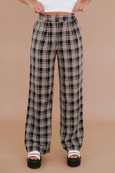 The Streetwear Plaid Pants are featured in a straight leg style fit with a black body & white/taupe plaid pattern. This piece has functional pockets and a high rise fit and looks ideal paired with your favorite graphic tees and bodysuits. Waistband: high-waisted Fabric: 85% Polyester, 10% Cotton, 5% Spandex Functional pockets High rise fit Straight leg style fit with a black body & white/taupe plaid pattern Imported Fit: True to size! Model Specs: Emily is wearing a size small in the photo.(Typical Sizing - Karli: S-Size 5/26 - 5ft 2in, Emily: S-Size 3/25 - 5ft 5in, Syd: L/XL- Size 15/ - 5ft 8in)Need help with sizing? No problem! Join our VIP group on Facebook, Everyday Chic Boutique VIP Insiders to chat directly with our team and other customers just like you.Packaged with love and shippe Chubby Girl Outfits, Plaid Pant, Dark Academia Clothes, Academia Clothes, Square Pants, Online Closet, Vip Group, Everyday Chic, Black Body