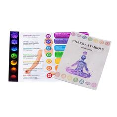 the chakra symbols book is open to show its contents and instructions for each item