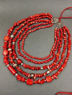 Multi-strand Red Coral Necklace With Polished Beads, Multi-strand Red Coral Beaded Necklace As Gift, Multi-strand Red Coral Beaded Necklace For Gift, Traditional Multi-strand Red Coral Necklaces, Traditional Multi-strand Red Coral Beaded Necklace, Traditional Multi-strand Red Coral Necklace, Handmade Multi-strand Red Coral Necklace, Multi-strand Red Coral Beaded Necklaces With Polished Beads, Handmade Multi-strand Red Coral Jewelry