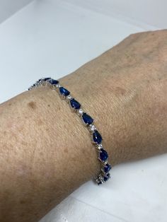 Vintage Cubic Zirconia Bracelet Clear blue Crystal Tennis 7.5 inches All jewelry is shipped free in the US in a nice gift box. Check out our over a THOUSAND great reviews Engraving is $4 per letter and is not always perfect depending on the piece. It can take a few days if the jeweler is busy. This is payable to Paypal Judithsltd@gmail.com Batman Gifts, Cubic Zirconia Bracelet, Bracelet Sterling Silver, Jordan 1 Retro, Blue Crystals, Chain Link Bracelet, Sterling Silver Bracelets, Rope Bracelet, Cubic Zirconia