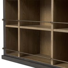 an open bookcase with wooden shelves and metal bars