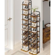 the shoe rack is holding many pairs of shoes