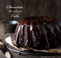 chocolate bourbon cake on a plate with a knife