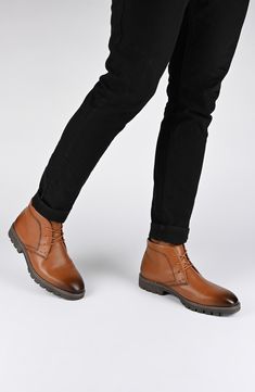 Elevate your work-to-weekend look in this refined faux-leather chukka boot featuring tonal stitch construction, breathable lining and a Tru Comfort Foam insole. Synthetic upper/textile lining/rubber sole Imported Brown Chukka Boots With Leather Lining For Business Casual, Business Casual Brown Chukka Boots With Leather Lining, Brown Leather-lined Chukka Boots For Work, Brown Leather Lined Chukka Boots For Work, Brown Chukka Boots With Leather Lining For Work, Brown Leather Chukka Boots For Business Casual, Casual Cognac Boots For Work, Brown Chukka Boots With Stitched Sole For Work, Brown Leather-lined Work Boots