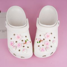 Lovely Cherry Blossom Floral Shoe Charms Include: 12pcs Shoe Charm ✿This shoe charm is made of resin material. Each shoe decoration is carefully made of high-quality materials, and the shoe decoration buttons are tightly fixed to the bottom, ensuring safety and durability and not easy to fall off and deform. You can DIY your crocs through our shoe accessories, making your shoes unique and showing off their unique charm. ✿The shoe accessories in our store are available in different colors and com Crocs Flower Charms, Cute Cherry Blossom, Crocs Aesthetic, Floral Shoe, Cross Shoes, Pink Crocs, Shoe Decoration, Accessories Making, Shoes Unique