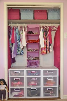 an image of a closet with clothes and other items on the shelves in front of it