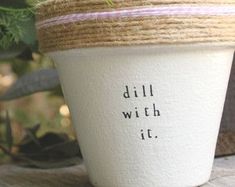 a potted plant with the words dill with it