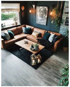 a living room filled with lots of furniture and decor