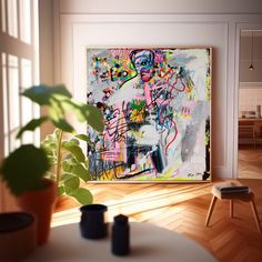 a painting is hanging on the wall next to a potted plant in front of it