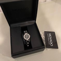 Women’s Movado Watch With Box Modern Analog Jewelry And Watches For Gift, Modern Analog Jewelry And Watches Gift, Modern Formal Watches With Box Included, Modern Diamond Watch For Gift, Elegant Formal Diamond Watch With Original Box, Oval Quartz Watch For Formal Occasions, Modern Analog Evening Watch, Movado Diamond Ring, Movado Womens Bold