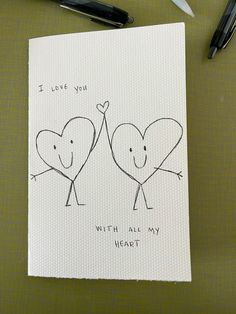 a card with two hearts holding hands and the words i love you written on it