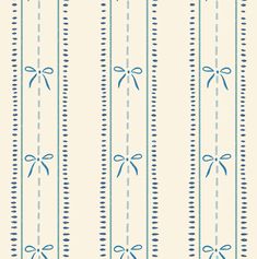 a blue and white striped wallpaper with bows on it