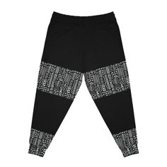 Elevate your loungewear and workout gear with these personalized jogging pants, adorned with a unique black and white African mud cloth print. Designed for both comfort and style, these unisex joggers offer a cozy fit perfect for relaxing or staying active. Crafted with a blend of 95% polyester and 5% spandex, they combine durability with just the right amount of stretch. Key features include double-layer side insert pockets for convenience, soft fabric for ultimate comfort, and an automatically Black Graphic Print Loungewear Pants, Black Stretch Bottoms With Graphic Print, Black Cotton Sportswear Joggers, Black Cotton Joggers Sportswear, Black Hip Hop Sweatpants For Loungewear, Black Stretch Cotton Joggers, Black Cotton Sweatpants For Sports, Black Cotton Sportswear Pants, Black Hip Hop Sweatpants For Gym