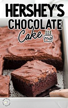 a close up of a cake with chocolate frosting on a pan and the words hershey's chocolate cake above it