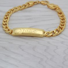 "Classic gourmet 18K Gold Plated bracelet with personalized name plate. Measurements of the bracelet: 5cm / 2\" length 1cm / 0.4 width 25 gram weight !! Name plate 5 cm . 2 inch wide 18cm=7inch 20cm=7.8inch 22cm=8.7inch The bracelet in the picture on the model is 18 cm / 7inch long Materials: The gold plated 18K is on brass and contains 2 microns of gold which makes the jewelry very high quality. The Silver jewelry is made from the precious metal 925 sterling silver with Rhodium plating. Rhodium Personalized Gold Bracelet, Chunky Bracelets, Id Bracelets, Gold Plated Bracelets, Name Bracelet, Personalized Bracelets, Custom Bracelets, Monogram Initials, Gold Plated Jewelry