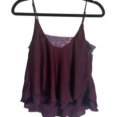 Free People Dark Purple Top With Glittery Bra Top. New With Tags. Women's Small. Brand New With Tags. Measurements (Approximate) Inner Tube Top: 15 Inches Widest At Hem: 25 Inches Length: 16 Inches (From Top Of Tube Top) Fabric Content Shell: 100% Polyester Lining: 100% Nylon Outer: 100% Polyester Back: 94% Polyester, 6% Elastane No Returns Accepted. Glamorous Purple Sequin Top, Casual Sequined Tank Top For Night Out, Summer Purple Sequined Tops, Casual Sequined Tank Top For Party, Spring Glitter Print Tops For Night Out, Glitter Print Tops For Spring Night Out, Spring Glitter Print Top For Night Out, Chic Glitter Tops For Summer, Summer Glitter Tops