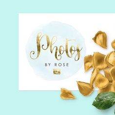 some gold leaves are on top of a white paper with the words photography by rose