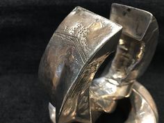 Tribal Silver Very Comfortable Cuff Nice Weight SOLD AS PAIR ONLY ! Tribal 1940's Antique Tribal Silver Bracelets RARE ! ! ANTIQUE COLLECTIBLE ETHNIC TRIBAL OLD SILVER This is such a Great Collectable Collection. Please Note ( Small wrist ) size 6 1/2 to 7 Yes ~ along with basic simplicity ~ It's all about you You deserve to know about my fabulous Treasure chest Heart Beat Handmade Tribal Jewelry, Statement Piece Jewelry, Art to Wear Jewelry, Fantastic Fine Leather Beaded Handbags, an array of t Unique Cuff Bangle For Formal Occasions, Unique Hand Cast Bracelets For Formal Occasions, Unique Formal Cuff Bracelet Bangle, Unique Formal Cuff Bracelet, Unique Engraved Bracelets For Formal Occasions, Unique Engraved Bangle For Formal Occasions, Ceremonial Polished Cuff Bangle Bracelet, Silver Polished Cuff Bracelet For Ceremonial Use, Ceremonial Bangle Cuff Bracelet With Polished Finish