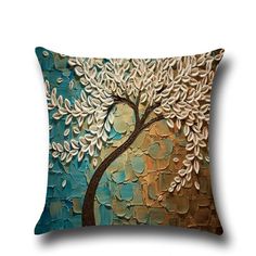 a decorative pillow with a tree painted on it