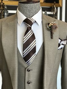 Color: Beige Striped Material: 49% Polyester, 49% Viscose, 2% Elastane Suit includes blazer, waistcoat & trousers Single-breasted suit (1 button blazer) Lapel type: peak lapels Jacket interior lining option: fully-lined Jacket Vent: Double Vent Fitting: slim-fit Care instructions: dry clean only Machine washable: no Striped Blazer Outfit, Blazer Waistcoat, Italian Mens Fashion, Striped Suit, Suit For Men, Stylish Suit, Lapel Jacket, Fashion Suits For Men, Slim Fit Suit